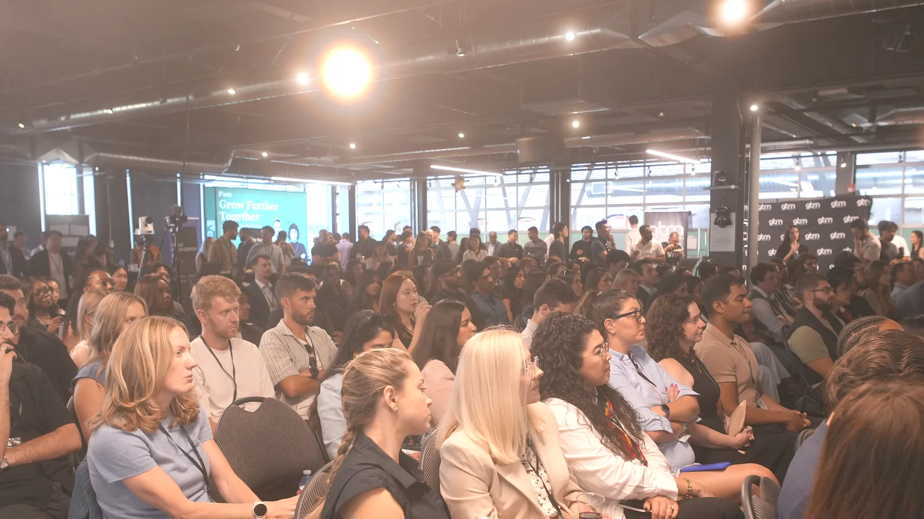 A full room of GTM North operators at the Vol. 2 fireside conversation